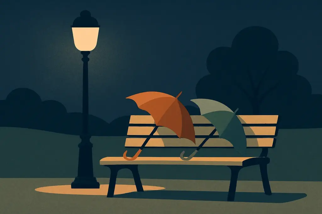A park bench holds two closed umbrellas, illuminated by a warm street lamp on a quiet evening.